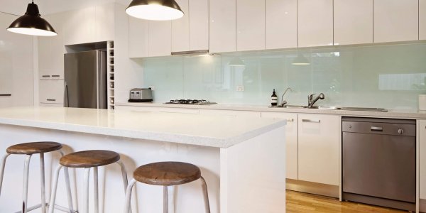 White contemporary kitchen with island
